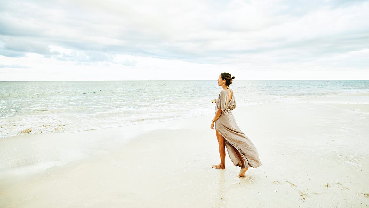 woman walking on the beach