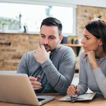 Couple managing finances.