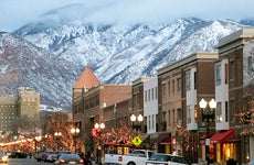 Historic 25th Street in Ogden, Utah, with snow-covered mountains in background