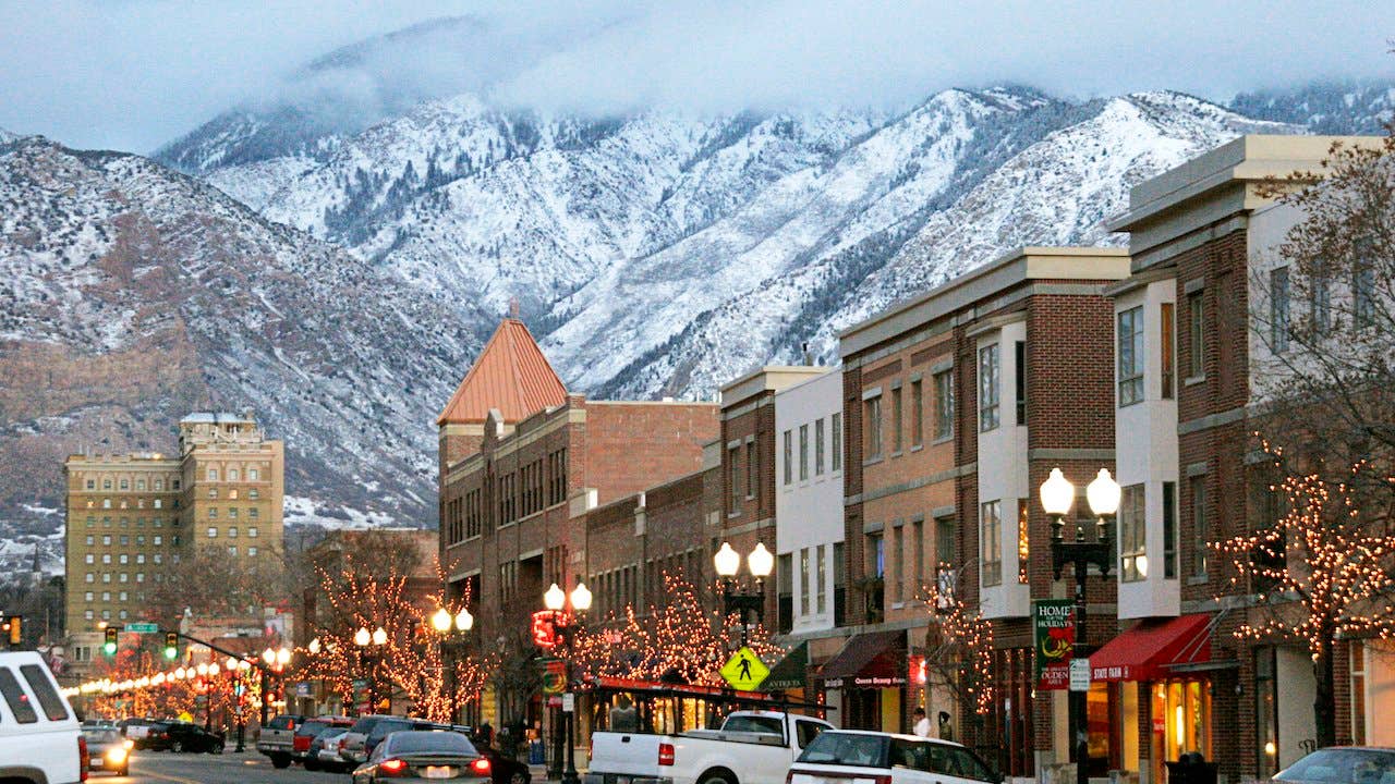 Historic 25th Street in Ogden, Utah, with snow-covered mountains in background
