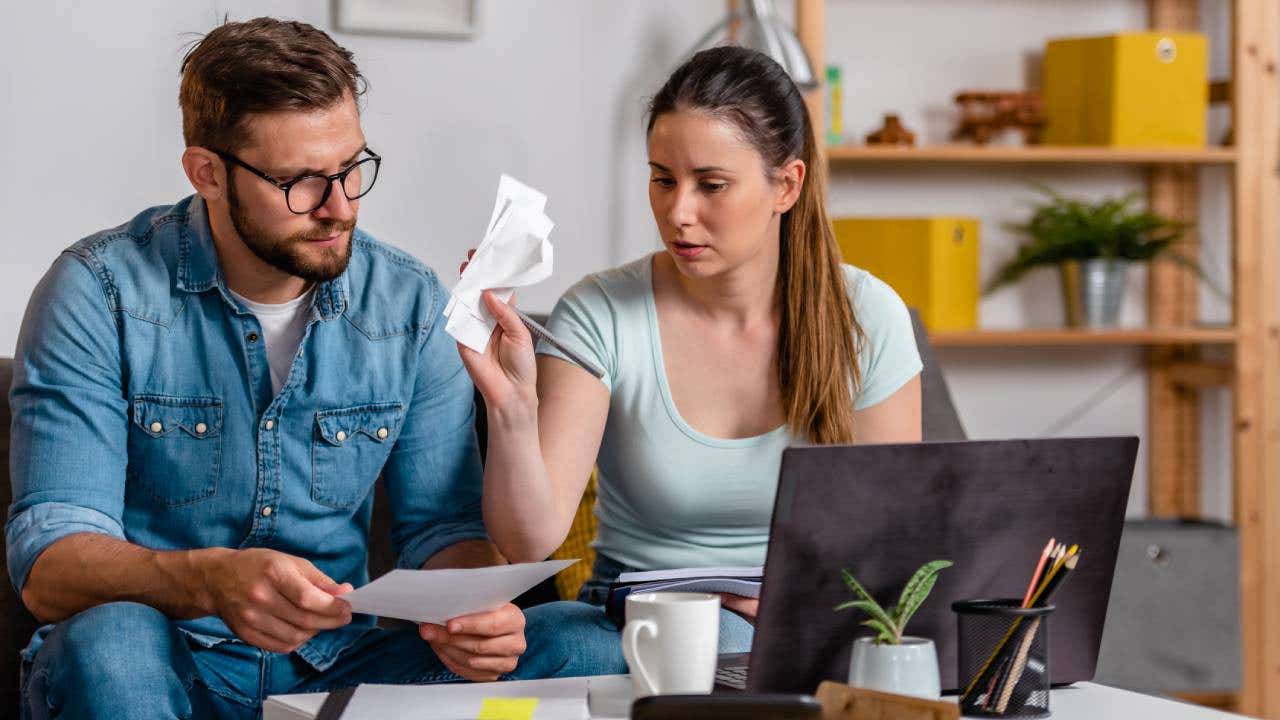 Young couple with financial bills