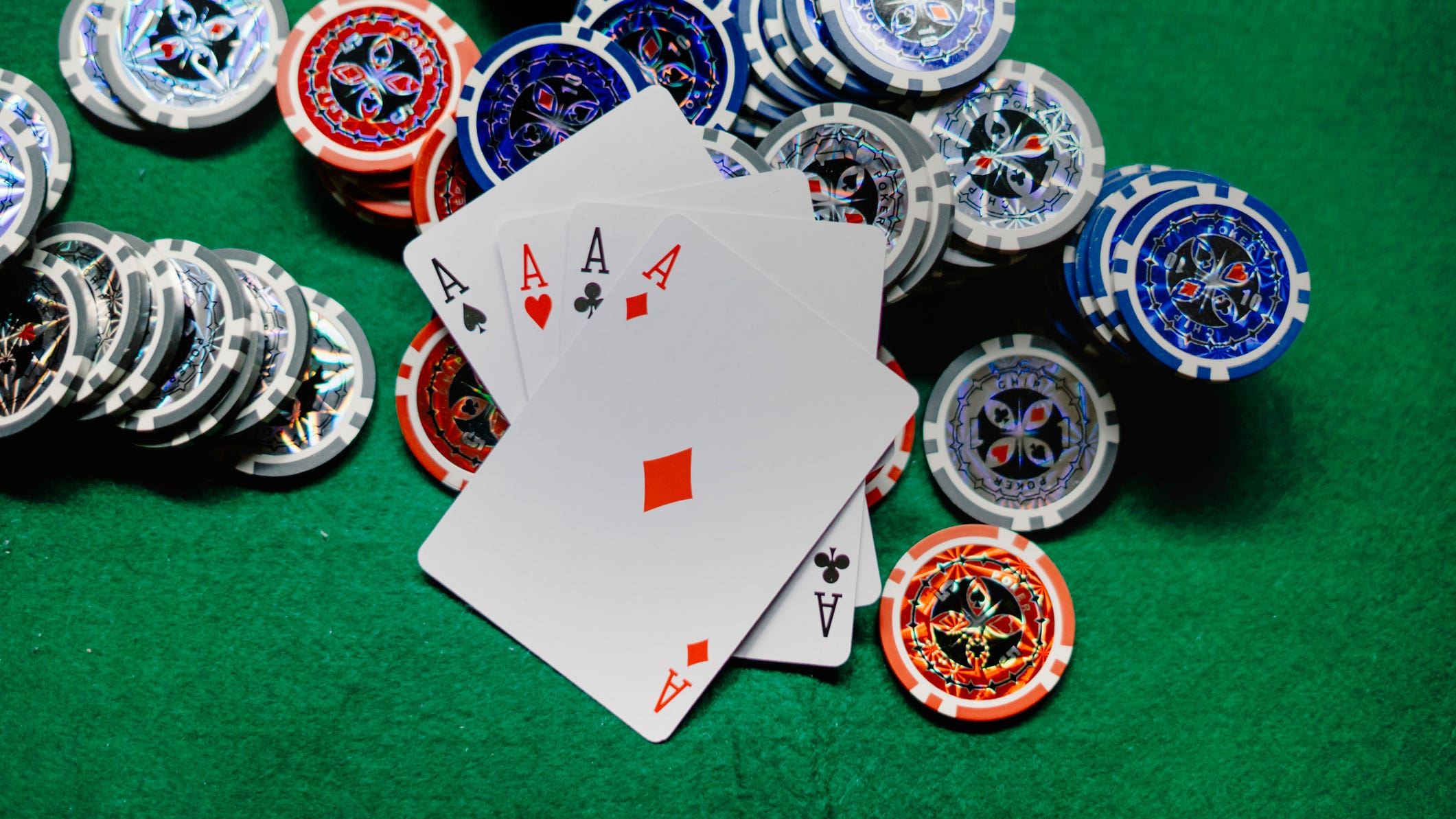 Playing poker cards and chips at the poker table