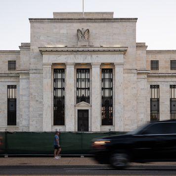 Prestigious government building with busy city life in front of it