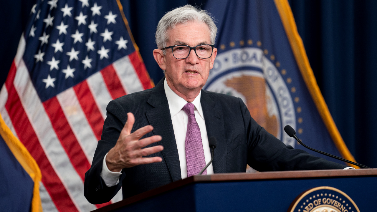 Federal Reserve Chair Jerome Powell speaks with journalists after the Fed's July meeting.