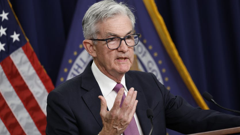 Fed chair Jerome Powell speaks from a dais