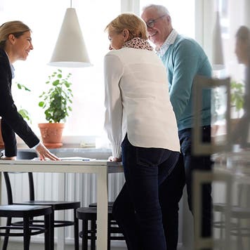 couple signing real estate papers