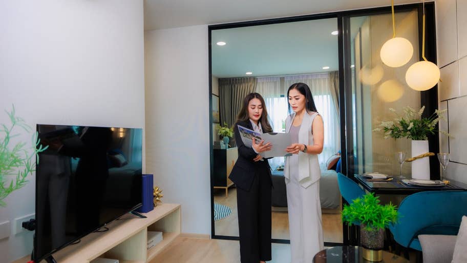 Two people looking at paperwork