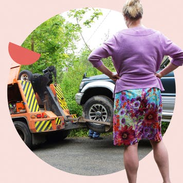 White woman facing away from camera, car getting toed in front of her. The image is framed in light pink and there is a red half-circle design on the left.