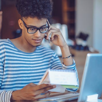 Young man working at home office