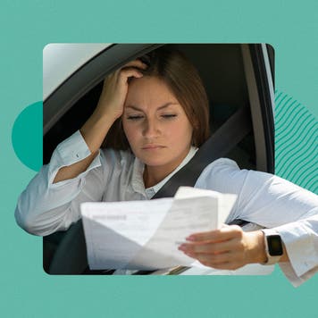 woman scratching head at paperwork