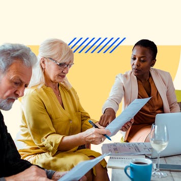 A married couple goes over some insurance documentation with a representative. There is a solid color graphical display added to the background.