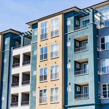 Exterior view of modern apartment building offering luxury rental units in Silicon Valley; Sunnyvale, San Francisco bay area, California