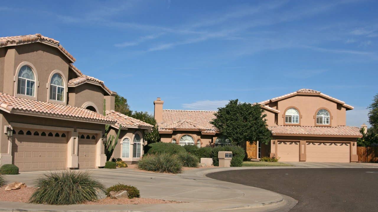Two homes on a typical north Scottsdale,AZ cul de sac