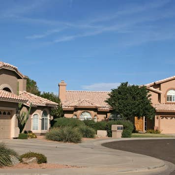 Two homes on a typical north Scottsdale,AZ cul de sac