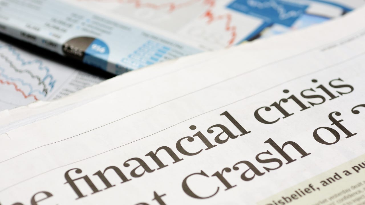 Newspaper with the headline financial crisis