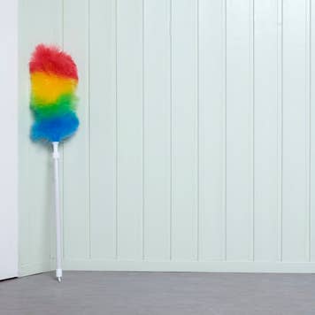 Multi-colored duster in a corner of a cleaned home