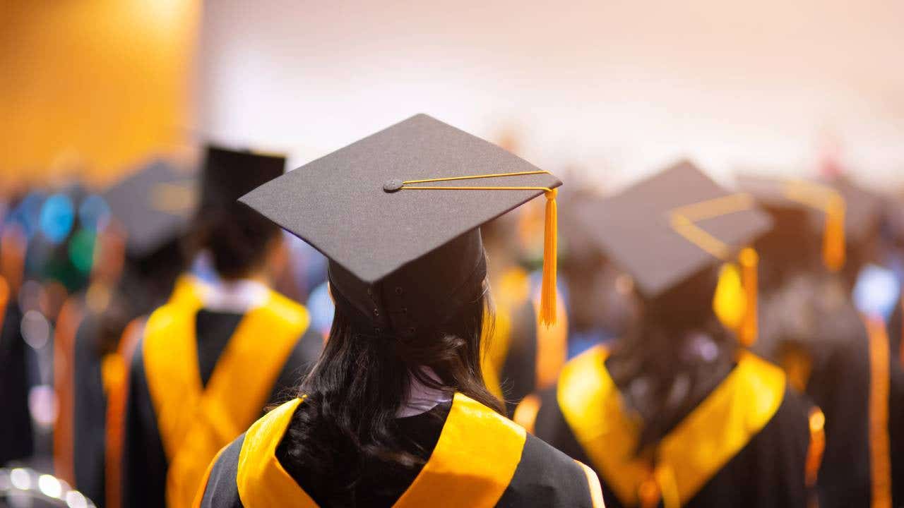 People Wearing Mortarboard In University