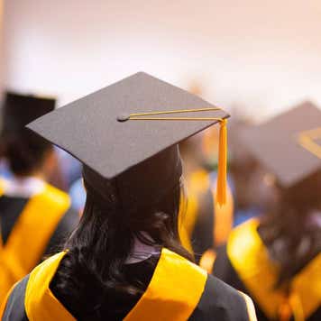 People Wearing Mortarboard In University
