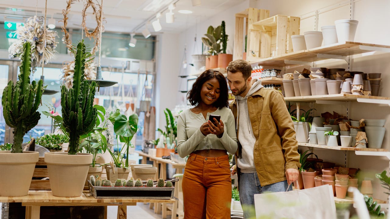 Young couple in flower shop