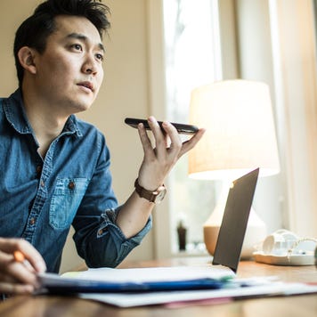 Man (early 30s) working in home office