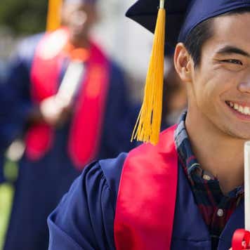 Graduate in cap and gown