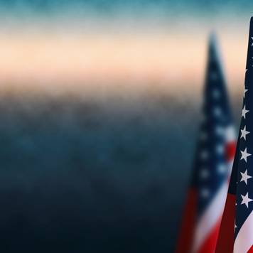 American flag against a fog background