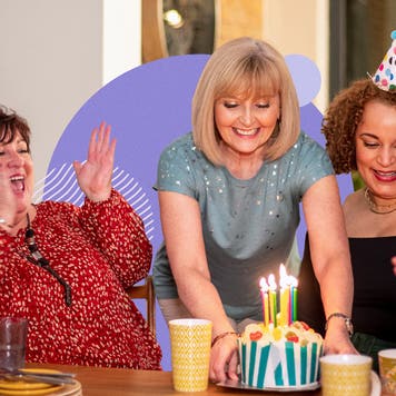 Older group of friends celebrating a birthday.