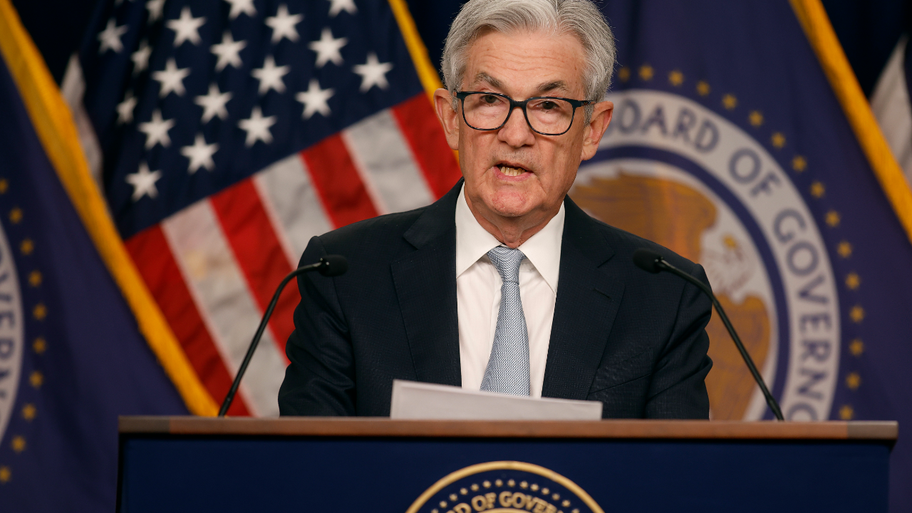 Fed Chair Jerome Powell at a podium speaking