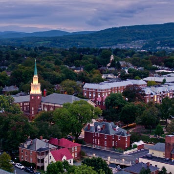 High Aerial Shot of Downtown Charlottesville, Virginia with Market Street Park