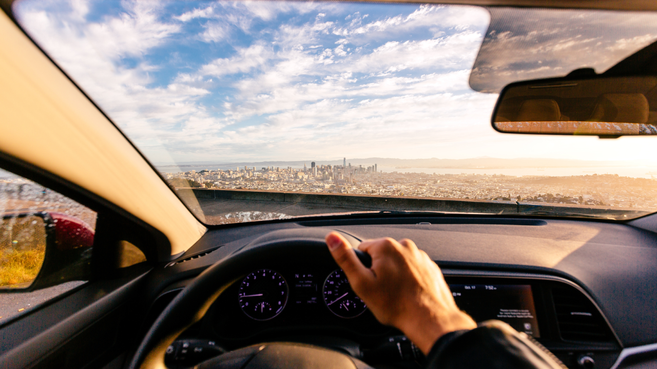 Driving car in San Francisco, personal perspective view, California, USA