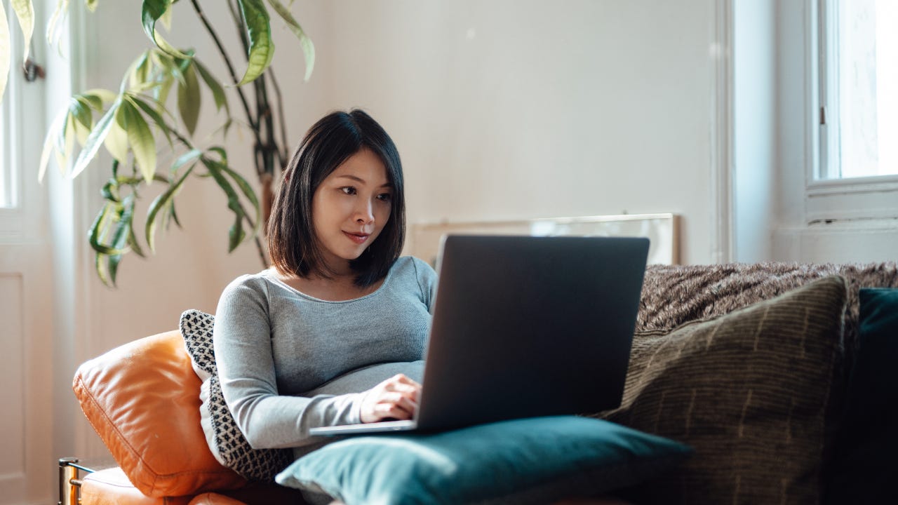 Woman typing on the computer