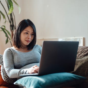 Woman typing on the computer