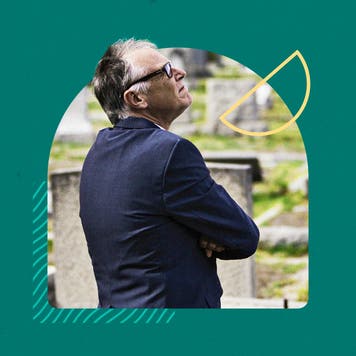 Person in a cemetery in mourning.