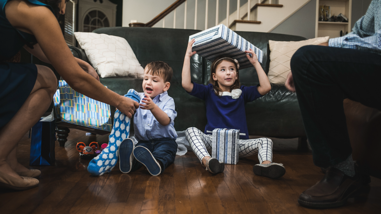 Happy young children with presents