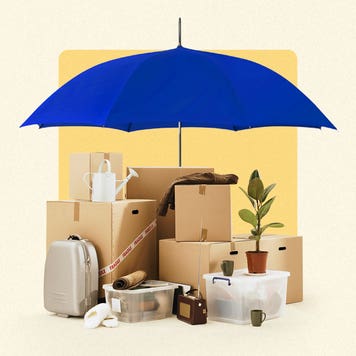A bunch of boxes and personal possessions with an umbrella over them (blue) symbolizing the theme of this article being about coverage for contents.