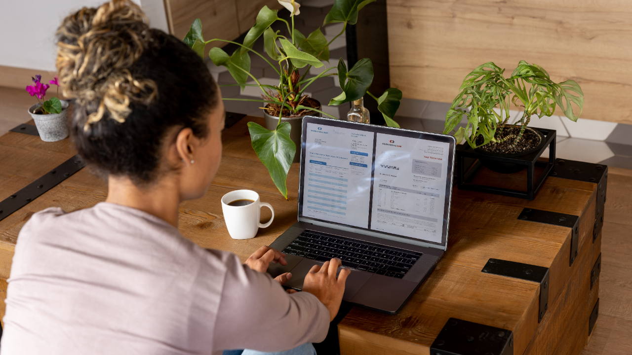 Woman sitting at desk on laptop