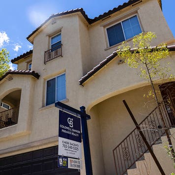 what not to say when selling your house - spanish style home with coldwell banker for sale sign out front