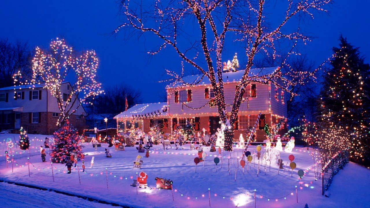 Outdoor Christmas decorations light up a home