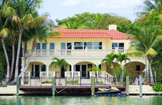 A Mediterranean-style house along the water in Miami Beach, FL.