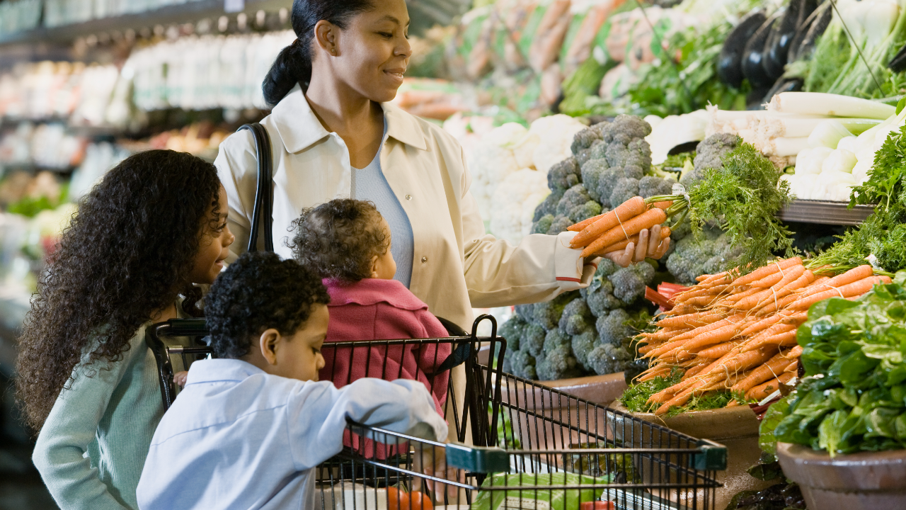 Family shopping at grocery store