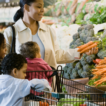 Family shopping at grocery store