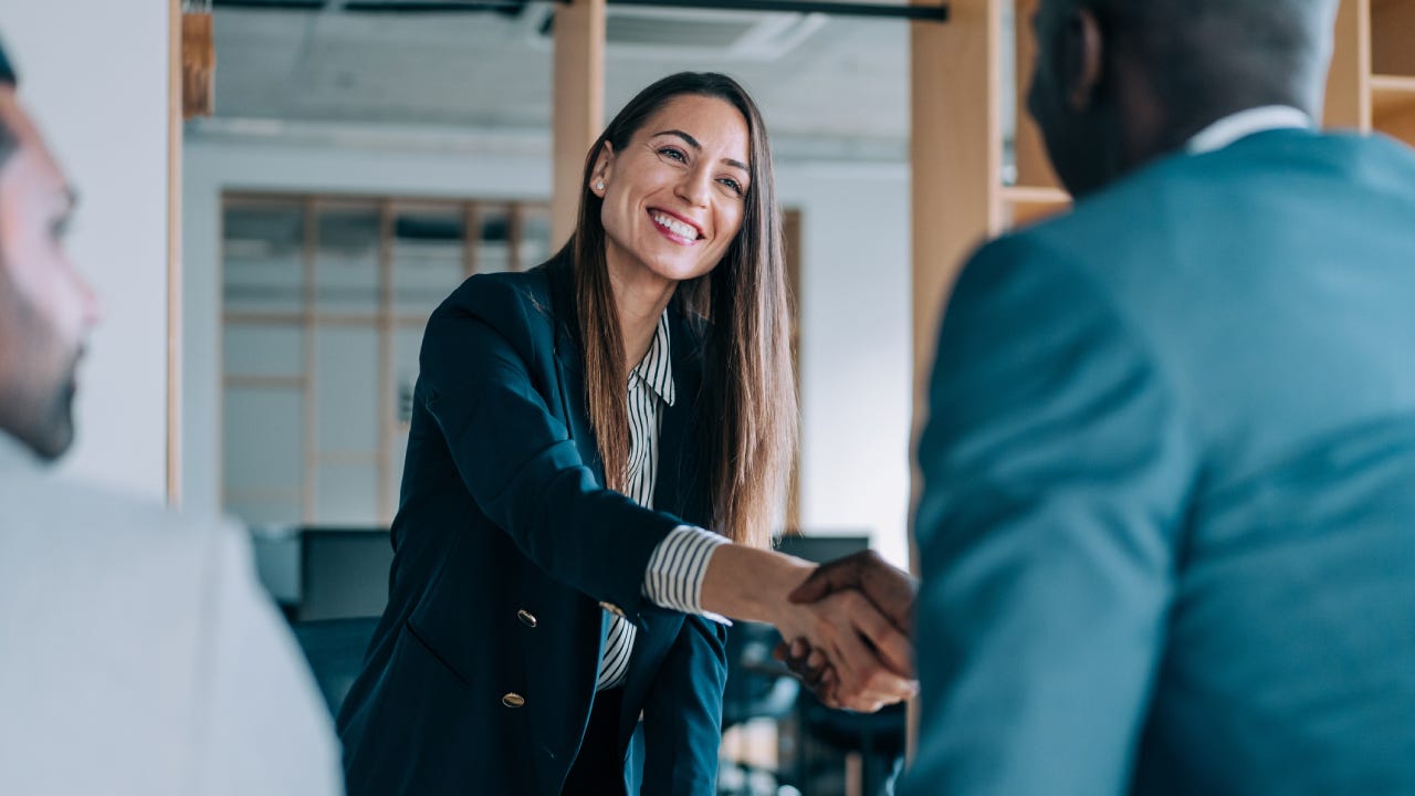 Business people shaking hands in the office