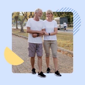 Older couple enjoying a walk together on a nice, Fall day
