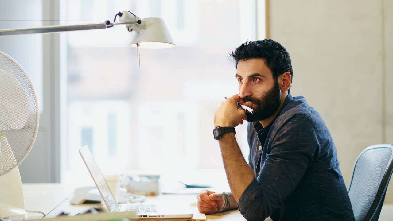 Man sitting at desk in Shoreditch office