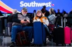 Couple sitting in an airport terminal