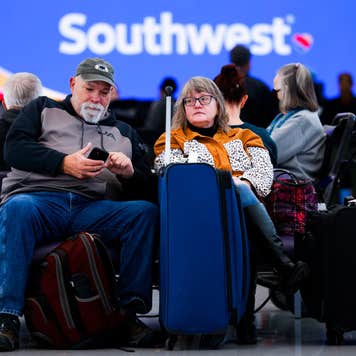 Couple sitting in an airport terminal