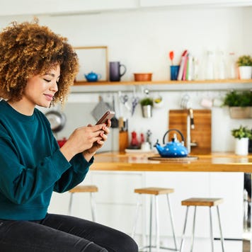 woman using her smartphone