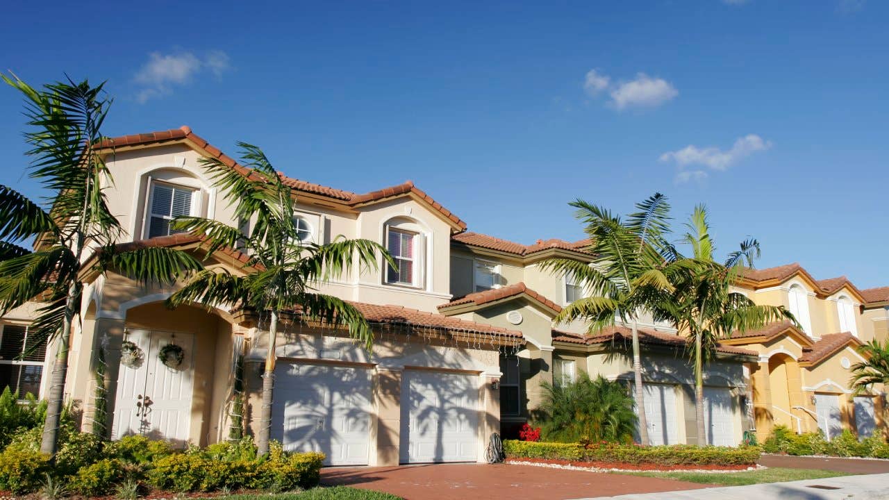 A beautiful house for a single family with palm trees