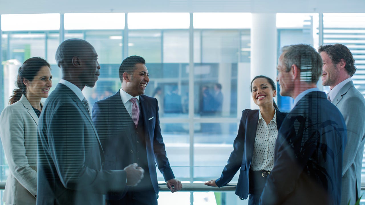 Businesspeople discussing in office