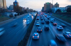Traffic at nightfall in modern city